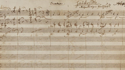 Detail aus dem Autograph der Zauberflöte, Signatur: Mus. ms. autogr. Mozart, W. A. 620. Seite 1: Mit Schriftzug von Georg Nikolaus Nissen: „Zauberflöte | Mozarts eigne Handschrift“