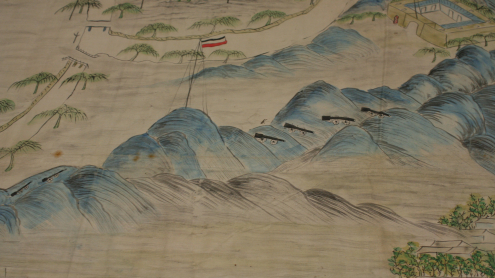 Detailansicht der Gebirgskette mit Kanonen und einer Flagge