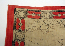 Detailansicht der Südküste Großbritanniens und der roten Uhrenverzierung in der linken oberen Ecke der Karte