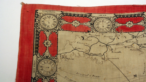 Detailansicht der Südküste Großbritanniens und der roten Uhrenverzierung in der linken oberen Ecke der Karte